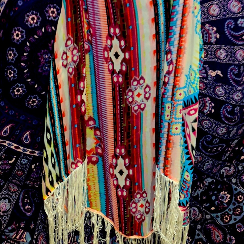 Colorful sleeveless flounce blouse